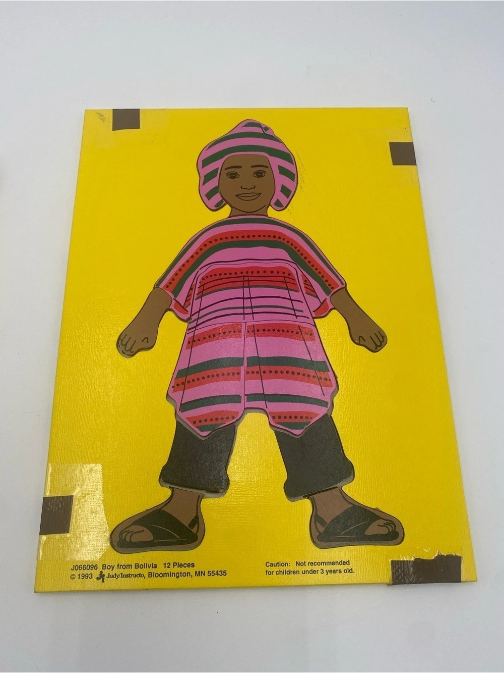 Vintage Judy Instructo Boy from Bolivia Wooden Tray Puzzle Yellow & Pink
